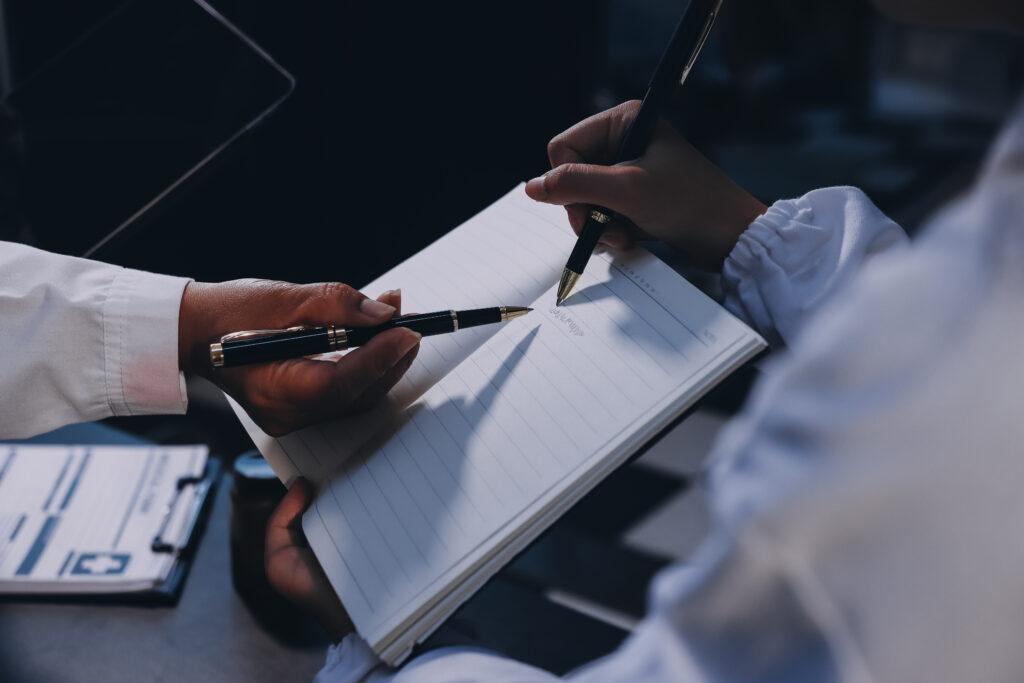 Hospital medical multi ethics people group meeting team in office with nurse students for vaccination education, talk event in clinic room. holding tablet and clipboard.